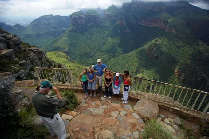 Tourists looking at the Three Rondavels. Blyde River Canyon. Mpumalanga. South Africa.