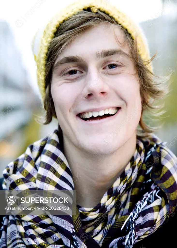 Happy guy with hat and scarf