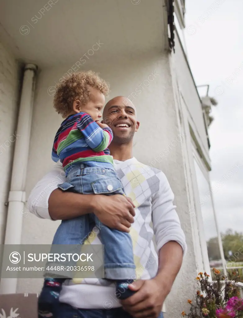 Dad holding his son