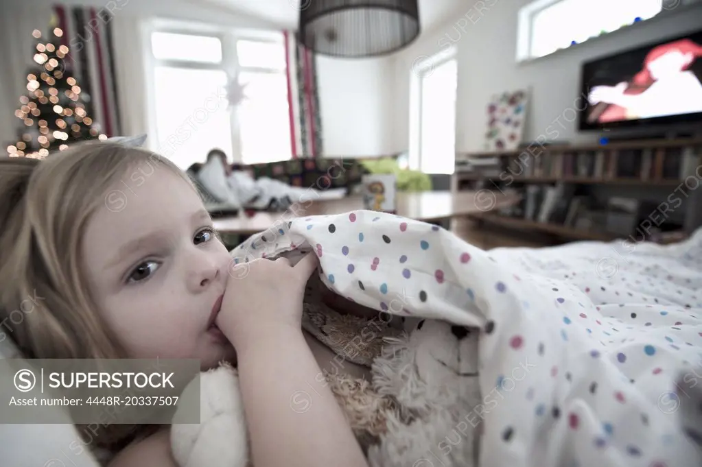 Girl resting in sofa