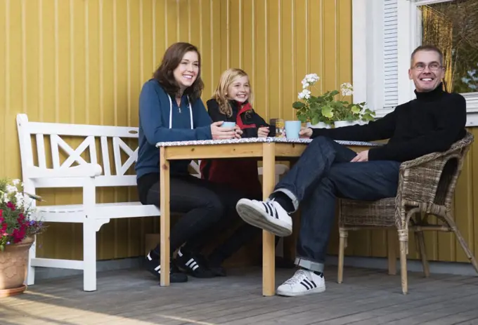 Family on verandah