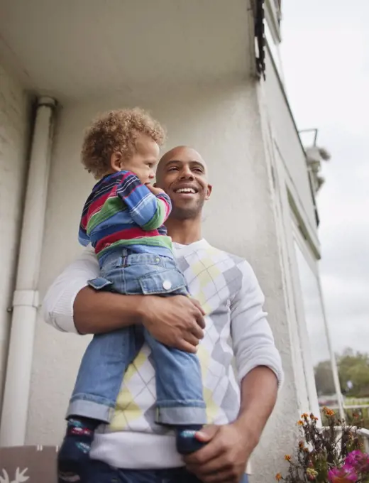 Dad holding his son