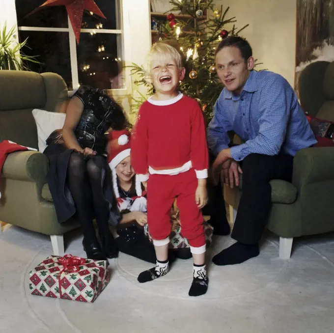 Boy in santa suit screaming