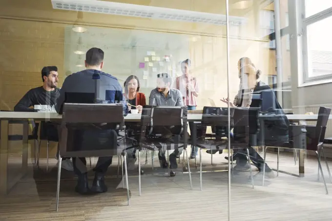 Multi-ethnic business people having discussion in conference room