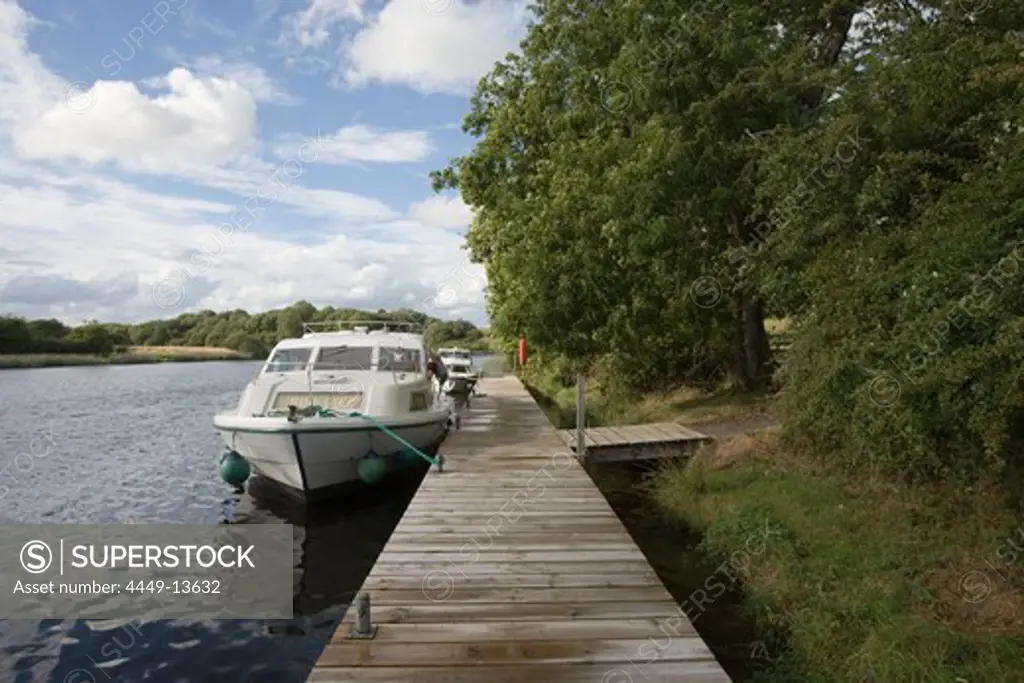 Houseboats at Tully-Inishmore Jetty, Inishmore Island, Lough Erne, County Fermanagh, Northern Ireland