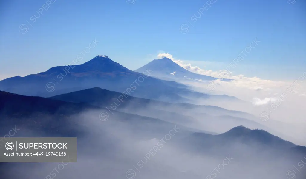 View of the Iztaccihuatl and Popocatepetl volcanoes near Mexico City, Mexico