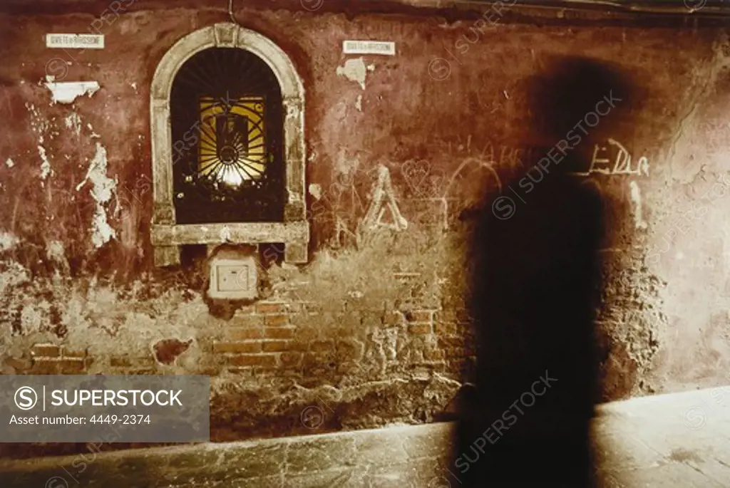 Picture of a saint in alley, Venice, Italy