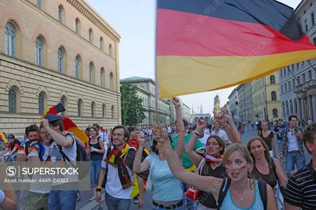 German soccer fans celebrating on Leopoldstrasse, Maxvorstadt, Munich, Bavaria, Germany