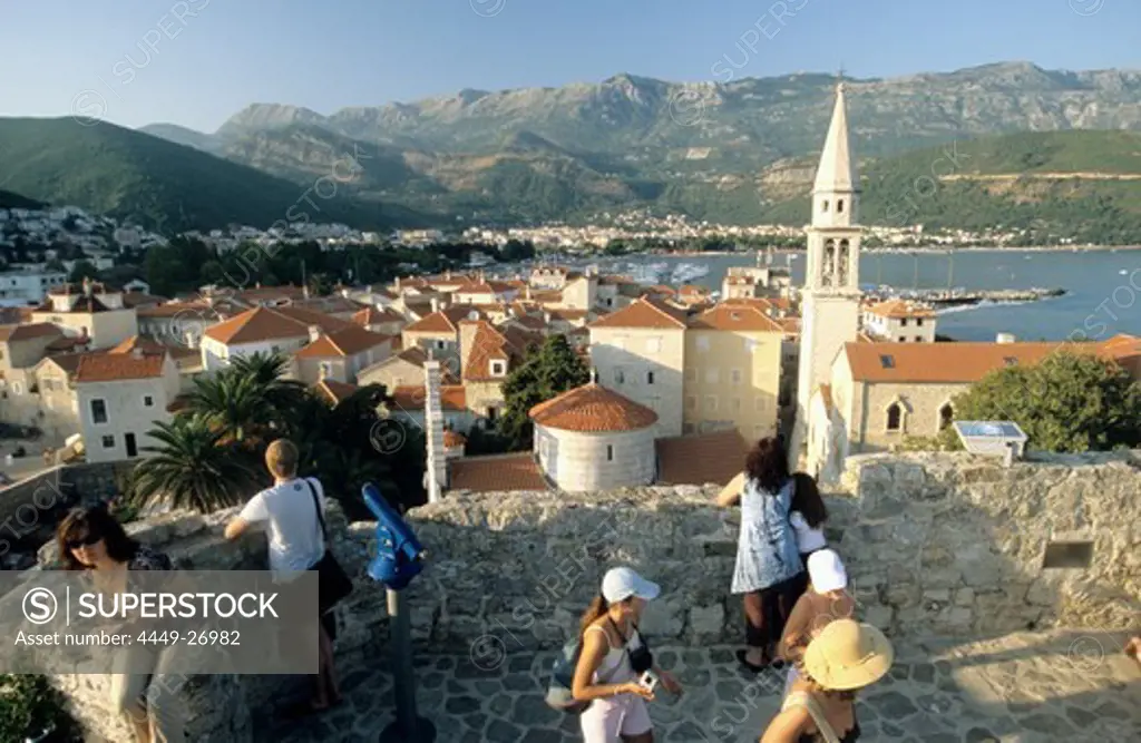 Tourists visit the castle of Budva, Budva, Montenegro