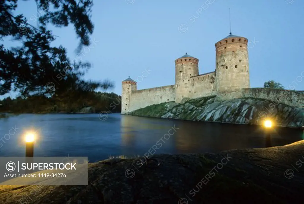 The Olavinlinna castle at Savonlinna lake in the evening, Karelia, Finland, Europe