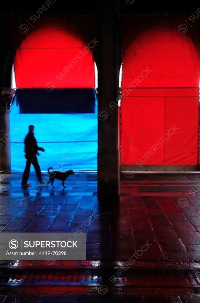 Man with dog at fish market, Venice, Veneto, Italy