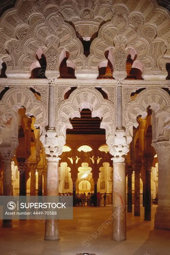 Artful horseshoe arches and columns in the Villaviciosa chapel of the Great Mosque Mezquita in Cordoba, Andalusia, Spain