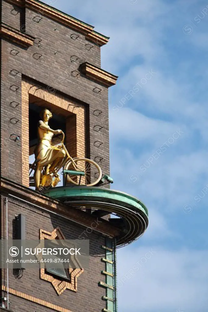 The Weather Girl (Danish: Vejrpigen), on the Richs building Richshuset, corner of Radhuspladsen and Vesterbrogade, Copenhagen, Denmark