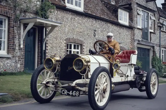 Lord Folkes-Halbart driving in his 1907 Mercedes-Benz near Eastbourne, East Sussex, England