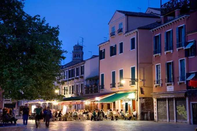 People sitting outside a restaurant bar, Campo Santa Margherita, Venice, Veneto, Italy