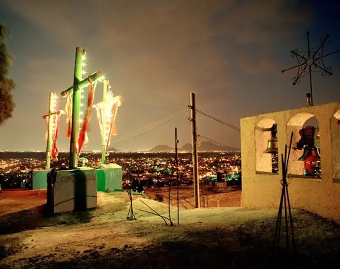 Illuminated roof of a church in the evening, view at Mexico City, Mexico, America