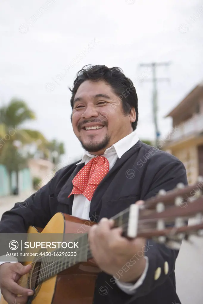 Mariachi player with guitar