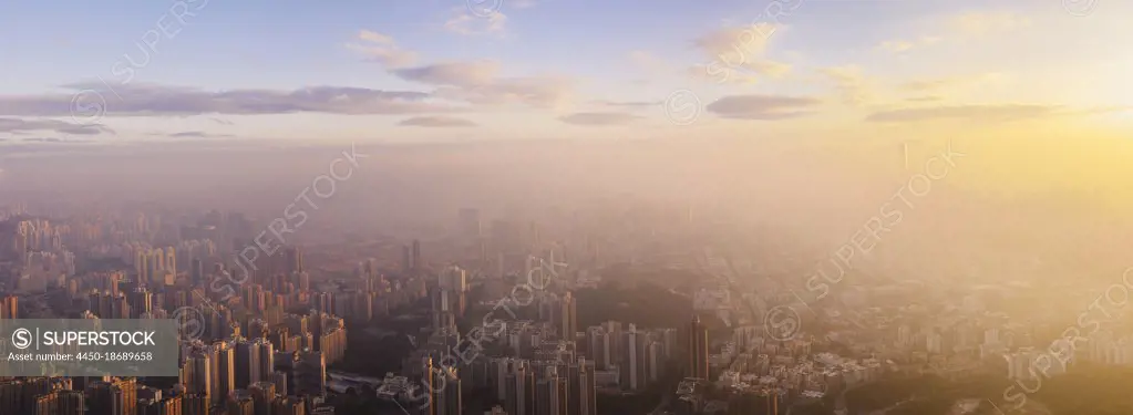 Hong Kong at sunrise with mist.