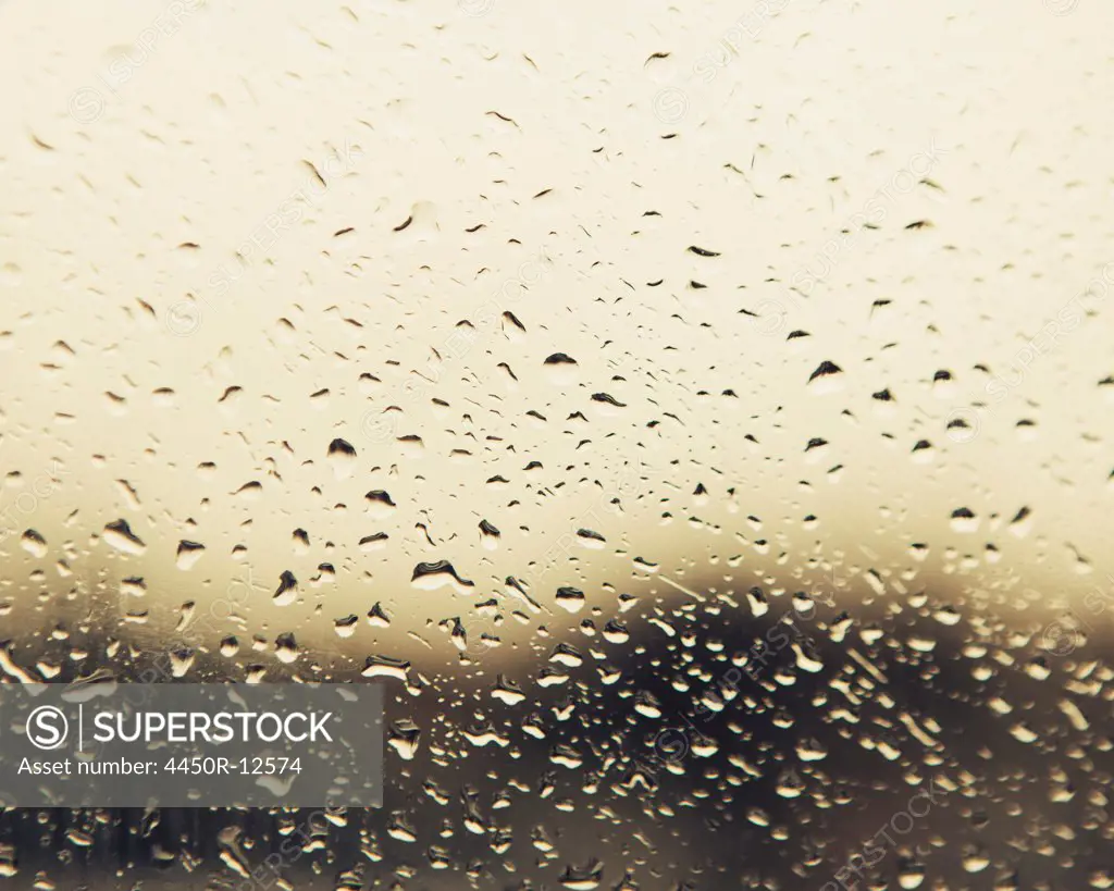 Rain water droplets on a window. View through the window on a rainy day. Seattle Seattle, Washington, USA