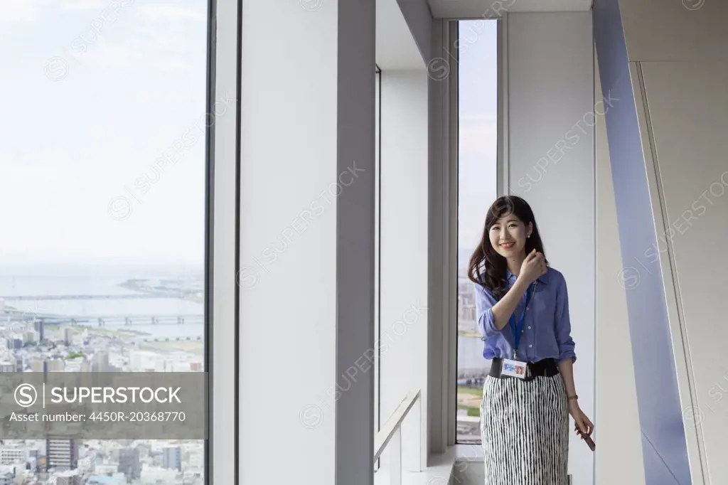 A working woman in an office building.