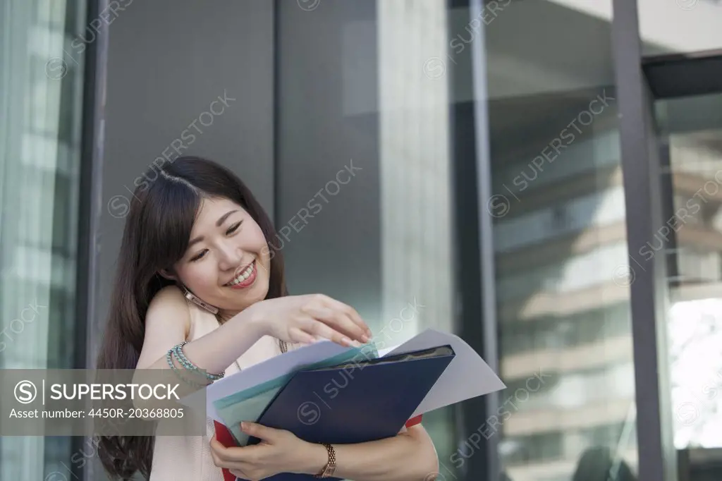 A working woman in an office building.