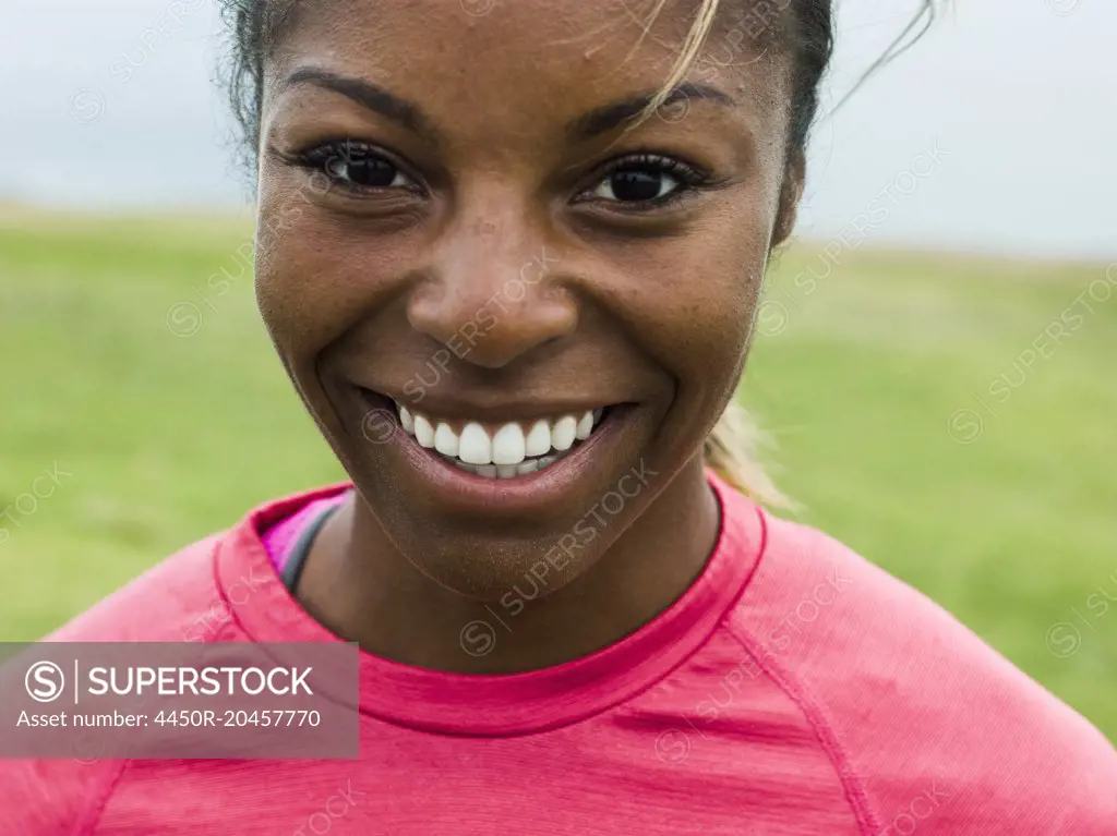 Portrait of a smiling young woman.