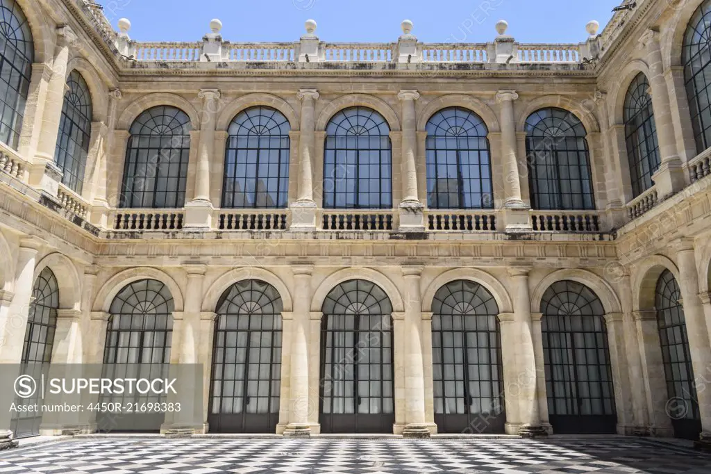 Courtyard of the General Archive of the Indies, Sevilla. A renaissance architectural site, a market and mercantile exchange. Tiled floor. 