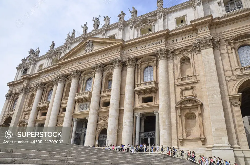 The facade of the historic St Peter's Basilica, at the heart of St Peter's square and the Vatican city in Rome.