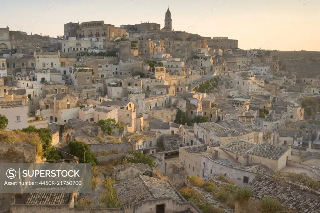 High angle view across rooftops of historic Italian city.