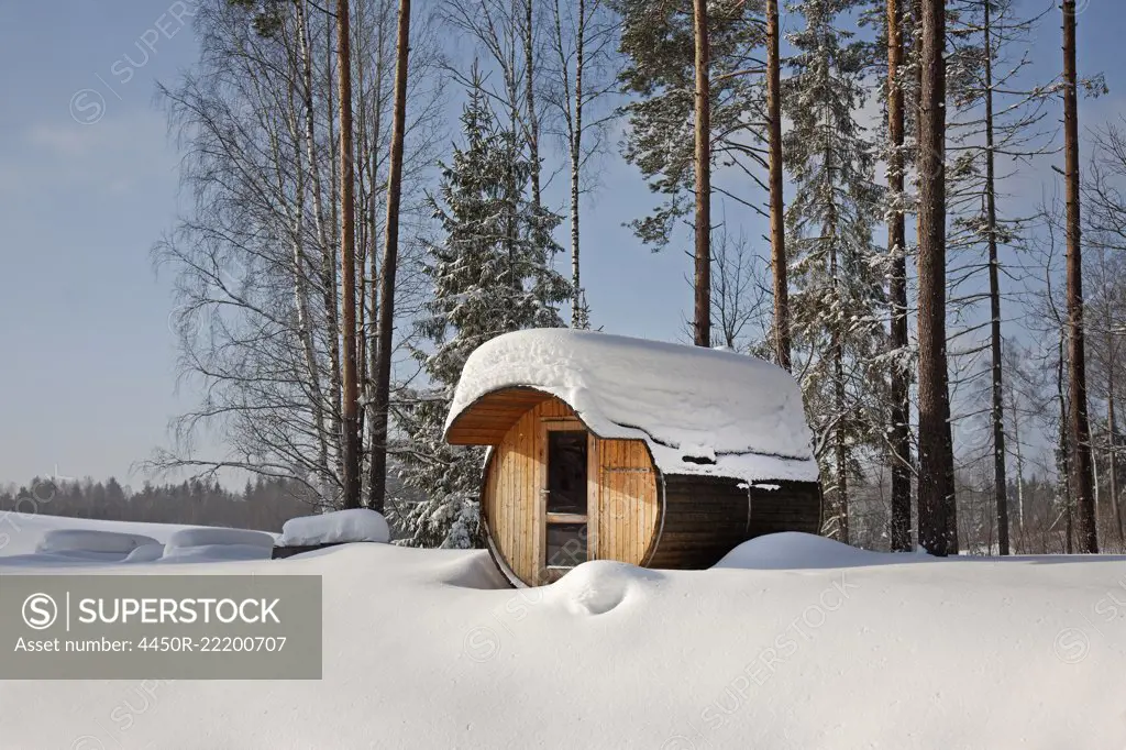 Round Barrel Sauna in the Snow