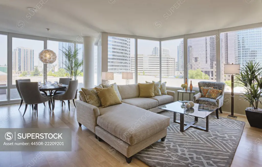 Living room and dining room in luxury highrise apartment