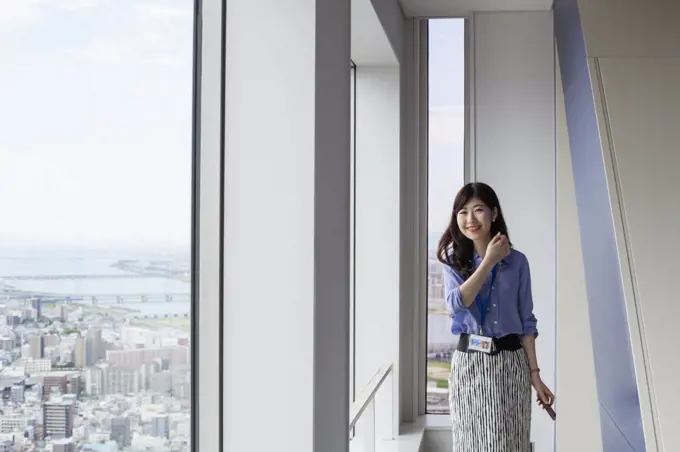 A working woman in an office building.