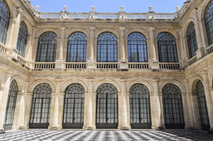 Courtyard of the General Archive of the Indies, Sevilla. A renaissance architectural site, a market and mercantile exchange. Tiled floor. 