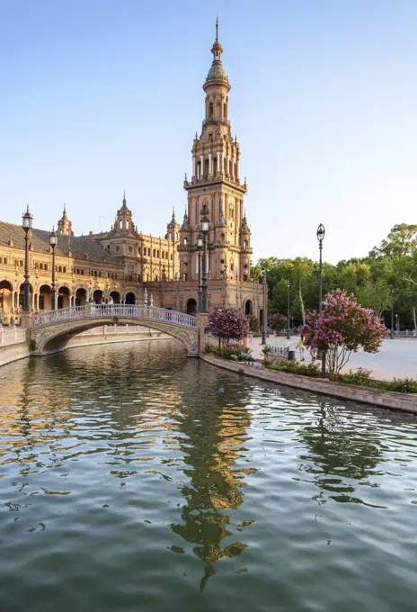 Plaza de Espana, a 20th century renaissance revival complex of buildings around a pool, with art deco aspects. Water and bridge. 