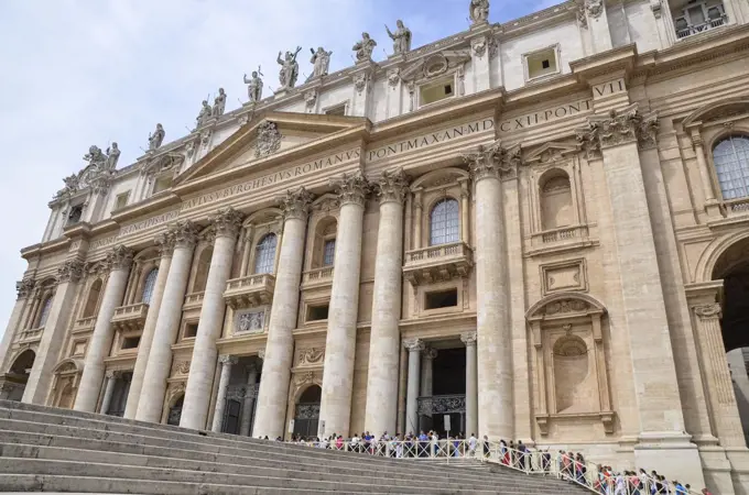 The facade of the historic St Peter's Basilica, at the heart of St Peter's square and the Vatican city in Rome.