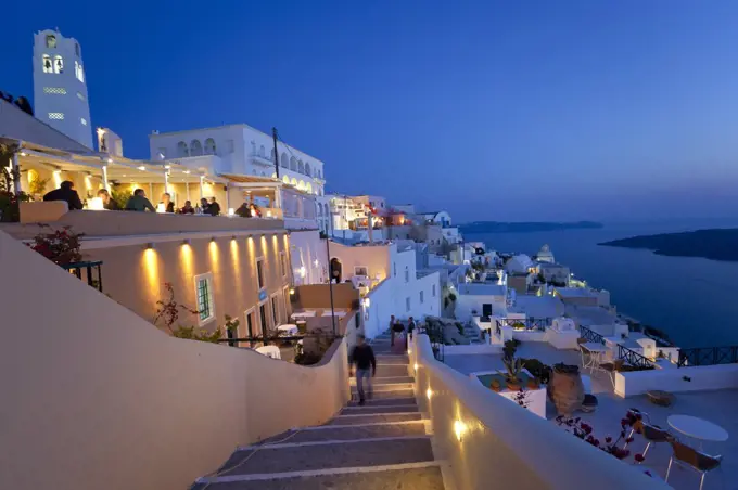 High angle view of traditional white washed houses on a Greek Island at dusk.