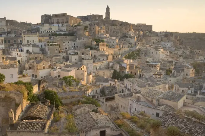 High angle view across rooftops of historic Italian city.