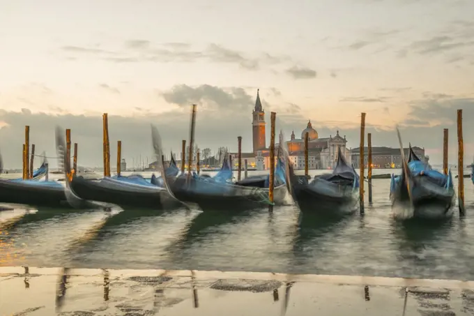 Gondola and Island San Giorgio Maggiore in Dusk in Venice, Italy.