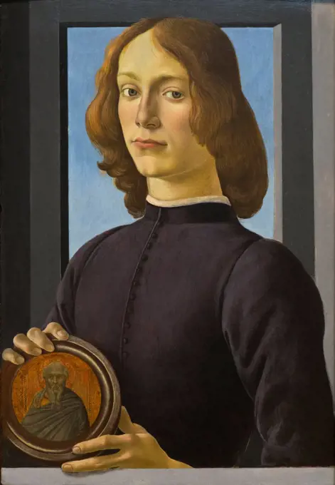 Botticelli (Alessandro di Mariano Filipepi); Italian; Florence 1444/45-1510 Florence; Portrait of a Young Man Holding a Medallion; ca 1480-84; Tempera on wood.