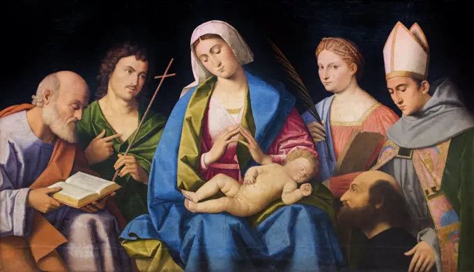 Mary; the child adoring; with Sts. Joseph; John d. T.; Catherine; Louis of Toulouse and the pacifier Lodovico Ariosto. (1474-1533). To 1512. (Vincenzo Catena; 1480 Venice; Venice -1531)