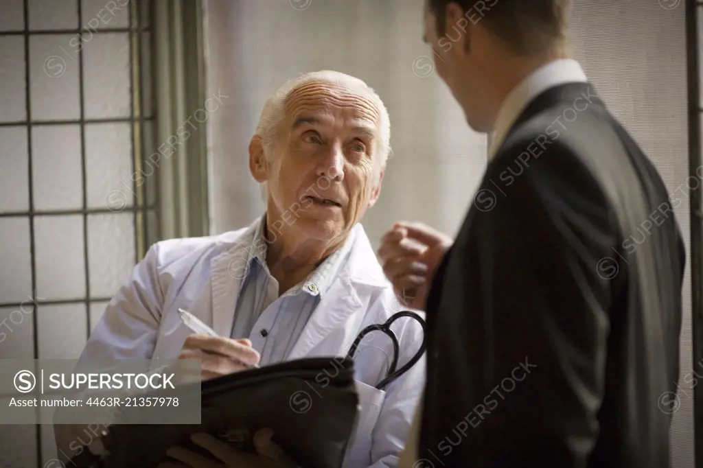 View of a doctor engrossed in a conversation.