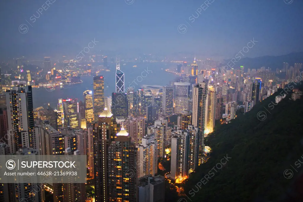 Illuminated cityscape at night.