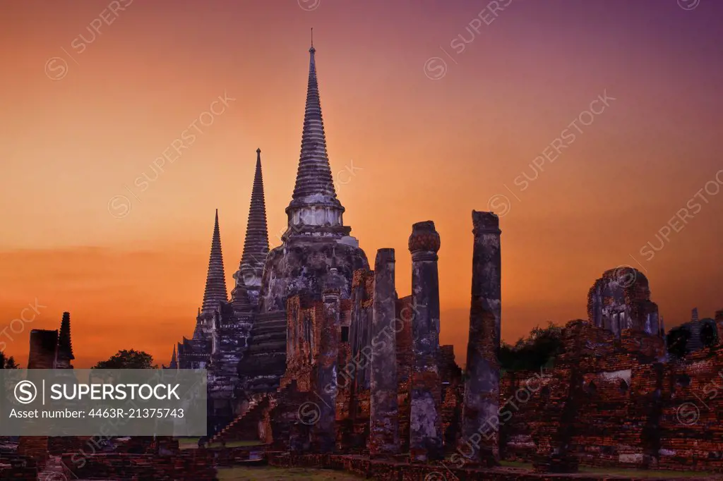 View of ancient ruin at sunset.