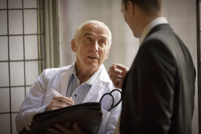 View of a doctor engrossed in a conversation.