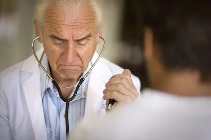 View of a doctor checking up a patient.