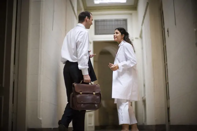 View of two people in a conversation.