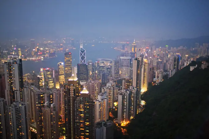 Illuminated cityscape at night.