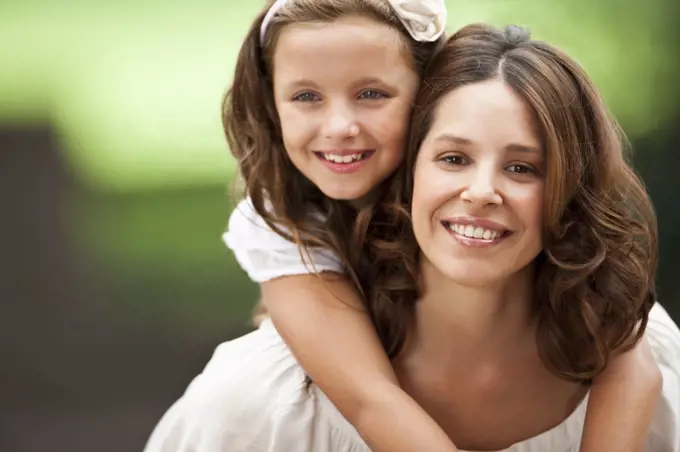 Portrait of mother and daughter.