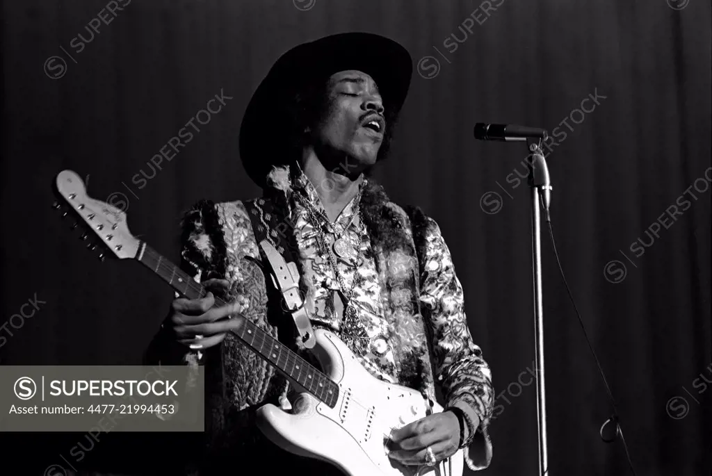 This photograph of Jimi Hendrix was made the evening of Sunday, February 18, 1968, at The Music Hall in Houston, TX. It was the second of two shows that the band played at The Music Hall that day, the first being an afternoon matinee.  There were three opening acts; The Soft Machine; Sundance; and The Moving Sidewalks, featuring a Lee High School senior by the name of Billy F. Gibbons, who played Purple Haze” during their opening set.  It was photographed with a Pentax H3v 35mm camera on Tri-X 