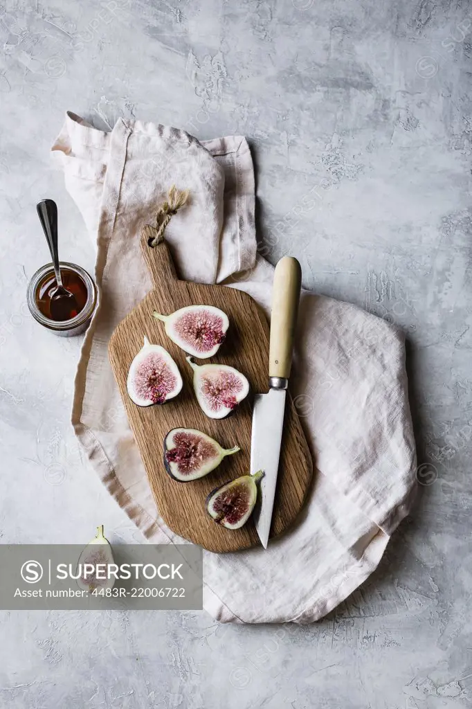 Sliced fresh figs on a chopping board